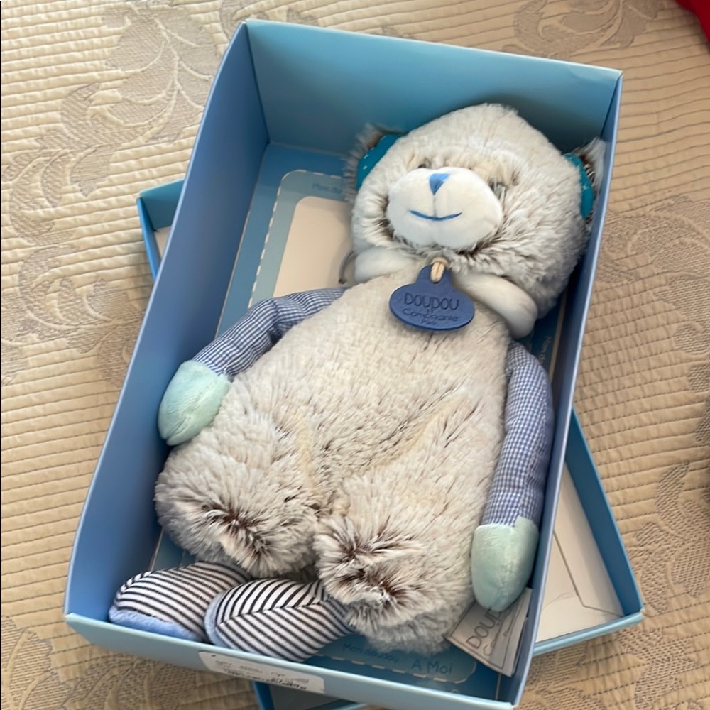 Gray and Blue Stuffed Animal